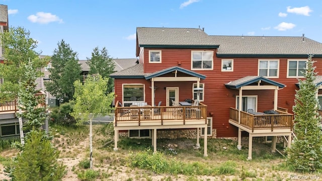 60 Black Diamond Trl Unit 60D, Silverthorne, CO 80498 - back of property featuring a wooden deck and roof with shingles