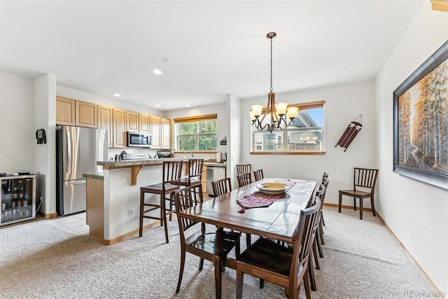 60 Black Diamond Trl Unit 60D, Silverthorne, CO 80498 - dining space featuring light carpet, a chandelier, and recessed lighting