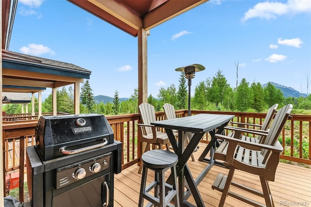 60 Black Diamond Trl Unit 60D, Silverthorne, CO 80498 - deck featuring a mountain view, a grill, and outdoor dining space
