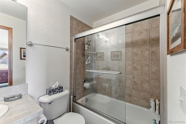 60 Black Diamond Trl Unit 60D, Silverthorne, CO 80498 - full bathroom with a textured wall, vanity, shower / bath combination with glass door, and a textured ceiling
