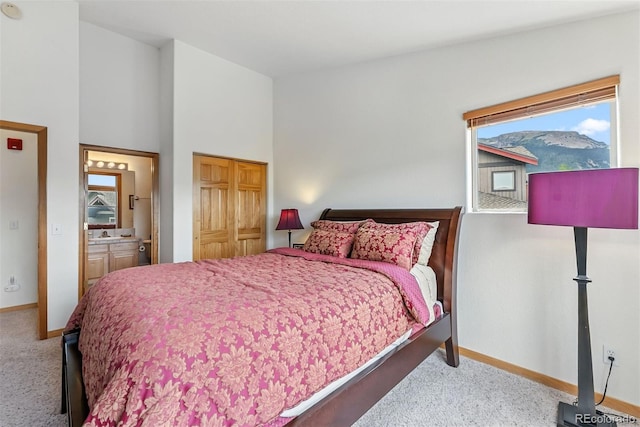 60 Black Diamond Trl Unit 60D, Silverthorne, CO 80498 - carpeted bedroom featuring multiple windows and connected bathroom