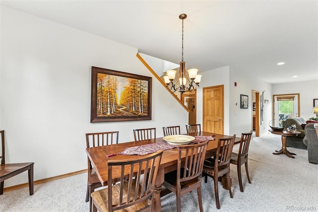 60 Black Diamond Trl Unit 60D, Silverthorne, CO 80498 - dining room with light colored carpet and a chandelier