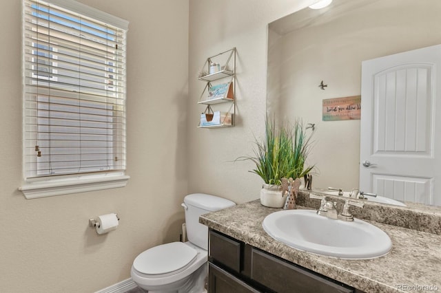 9233 Waters Edge Dr, Fountain, CO 80817 - half bath featuring vanity and toilet