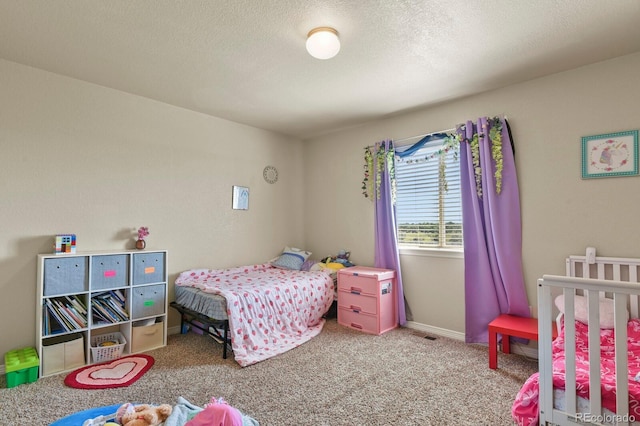9233 Waters Edge Dr, Fountain, CO 80817 - bedroom featuring carpet floors and a textured ceiling