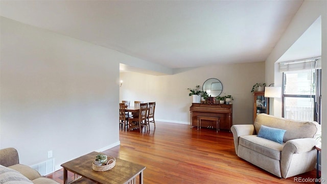 6278 E Euclid Ave, Centennial, CO 80111 - living room with light wood-type flooring and baseboards