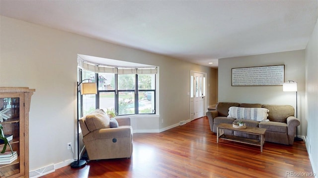 6278 E Euclid Ave, Centennial, CO 80111 - living area featuring wood finished floors and baseboards