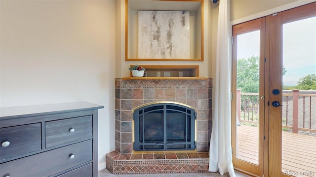 6278 E Euclid Ave, Centennial, CO 80111 - living room with french doors and a tile fireplace