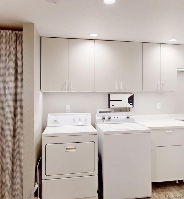 6278 E Euclid Ave, Centennial, CO 80111 - laundry room featuring washing machine and clothes dryer, wood finished floors, cabinet space, and recessed lighting