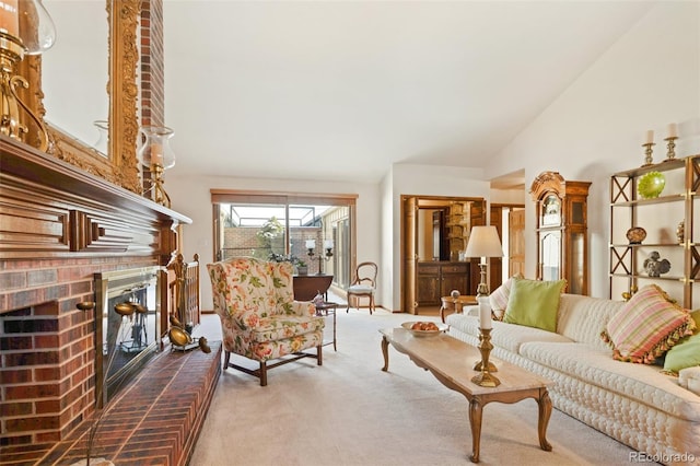 carpeted living room with a brick fireplace and vaulted ceiling