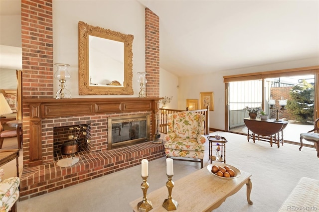 carpeted living room with vaulted ceiling and a fireplace