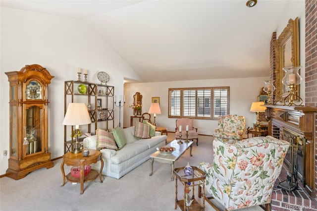 living room featuring a brick fireplace, vaulted ceiling, and carpet