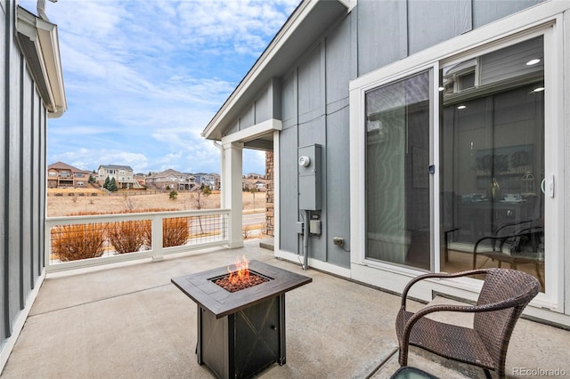 view of patio / terrace with a fire pit