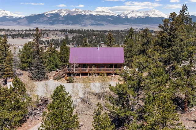 1838 E Longbow Dr, Como, CO 80432 - aerial view of property and surrounding area with a mountain backdrop and a forest