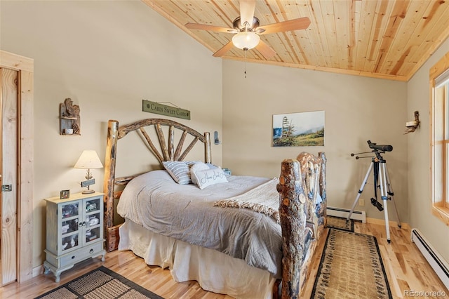 1838 E Longbow Dr, Como, CO 80432 - bedroom featuring baseboard heating, wood ceiling, wood finished floors, vaulted ceiling, and baseboards
