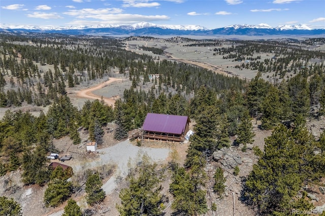 1838 E Longbow Dr, Como, CO 80432 - view from above of property featuring a mountainous background and a heavily wooded area