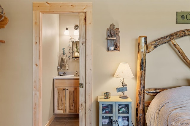 1838 E Longbow Dr, Como, CO 80432 - tiled bedroom featuring a sink