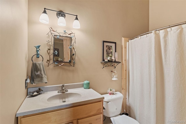 1838 E Longbow Dr, Como, CO 80432 - bathroom featuring vanity, toilet, and curtained shower