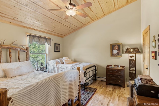 1838 E Longbow Dr, Como, CO 80432 - bedroom featuring wooden ceiling, lofted ceiling, light wood finished floors, baseboard heating, and ceiling fan