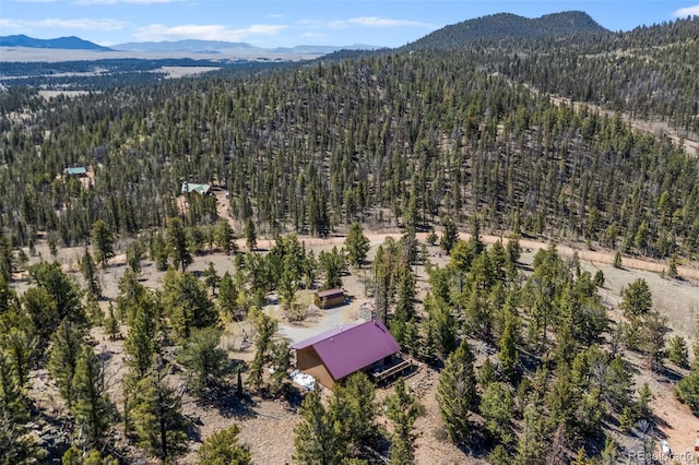 1838 E Longbow Dr, Como, CO 80432 - bird's eye view of a heavily wooded area and a mountainous background