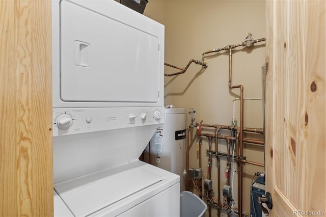 1838 E Longbow Dr, Como, CO 80432 - washroom with estacked washer and dryer and water heater