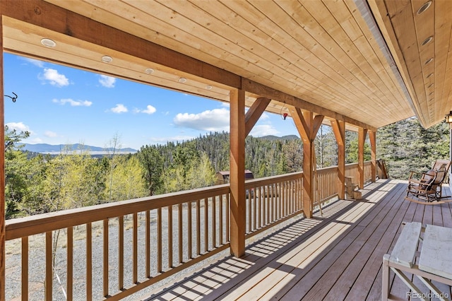 1838 E Longbow Dr, Como, CO 80432 - wooden terrace featuring a mountain view and a forest view