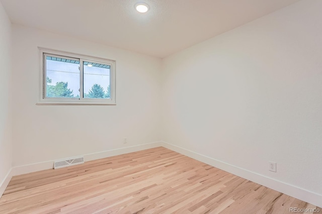 10698 W 26th Ave, Lakewood, CO 80215 - empty room featuring baseboards, light wood finished floors, and recessed lighting