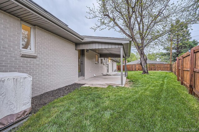 10698 W 26th Ave, Lakewood, CO 80215 - view of yard featuring a patio area