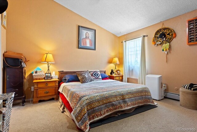 bedroom with light colored carpet, a textured ceiling, vaulted ceiling, and a baseboard heating unit