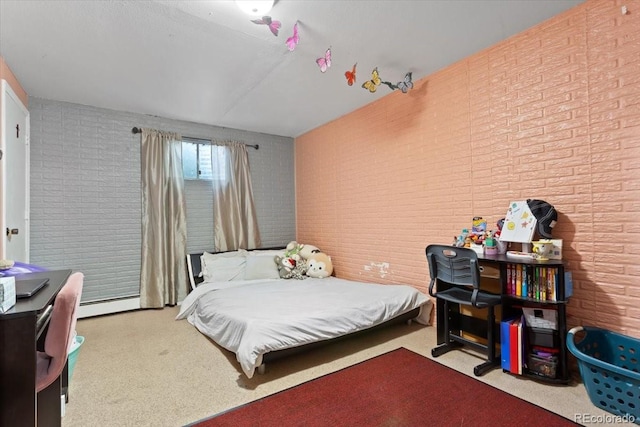 bedroom with light carpet, baseboard heating, and brick wall