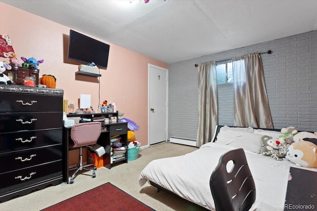 carpeted bedroom featuring brick wall and baseboard heating