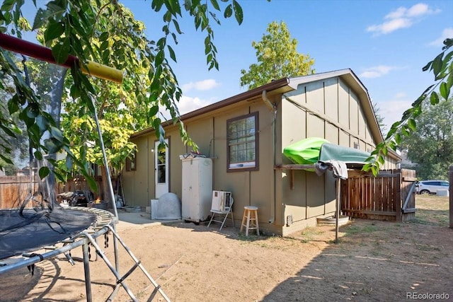 back of house with a patio area