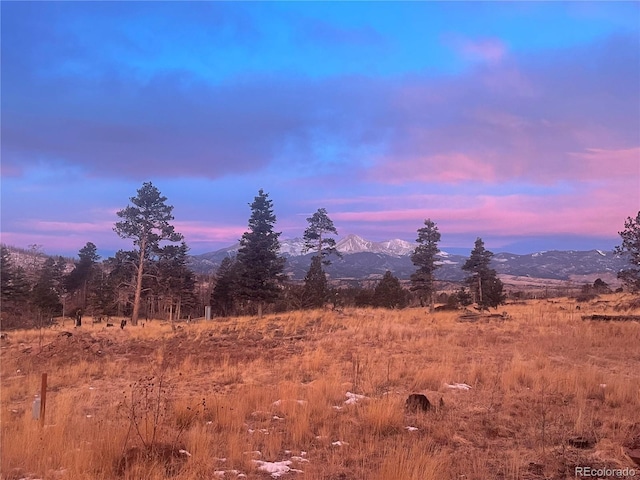 nature at dusk featuring a mountain view