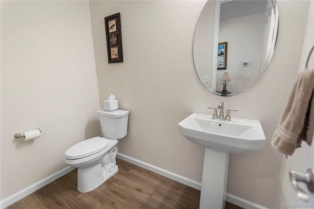 4121 River Oaks St, Castle Rock, CO 80104 - bathroom with toilet and wood finished floors