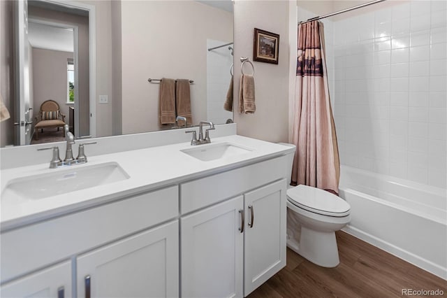 4121 River Oaks St, Castle Rock, CO 80104 - bathroom with wood finished floors, double vanity, and shower / bath combo