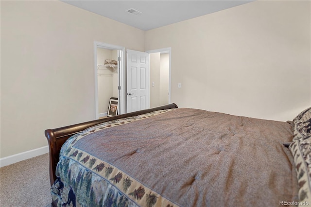 4121 River Oaks St, Castle Rock, CO 80104 - carpeted bedroom featuring baseboards and a walk in closet