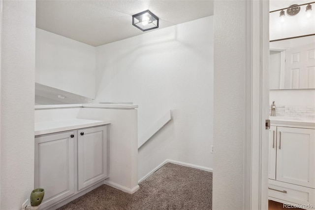 12753 Buckhorn Creek St, Parker, CO 80134 - bathroom with vanity and baseboards