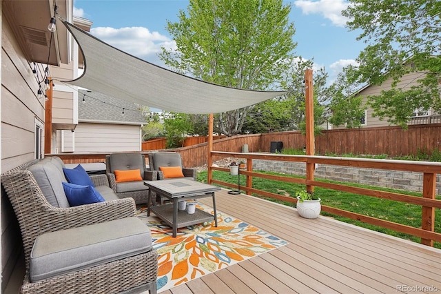 12753 Buckhorn Creek St, Parker, CO 80134 - wooden terrace featuring a fenced backyard and an outdoor living space