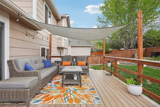 12753 Buckhorn Creek St, Parker, CO 80134 - deck featuring an outdoor hangout area and cooling unit