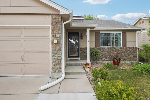 12753 Buckhorn Creek St, Parker, CO 80134 - view of exterior entry with stone siding, an attached garage, and a shingled roof