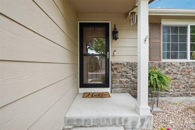 12753 Buckhorn Creek St, Parker, CO 80134 - view of exterior entry with stone siding and covered porch