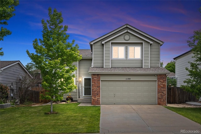 11188 Latigo Ln, Parker, CO 80138 - traditional-style house featuring concrete driveway, a garage, a shingled roof, and brick siding