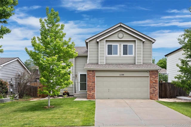 11188 Latigo Ln, Parker, CO 80138 - traditional home with brick siding, driveway, a shingled roof, and an attached garage