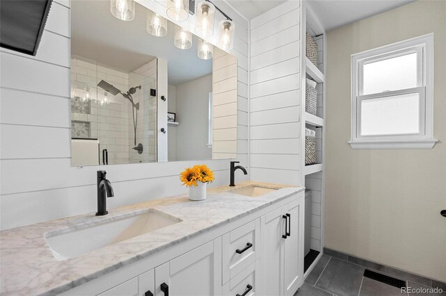 11188 Latigo Ln, Parker, CO 80138 - bathroom with a stall shower, double vanity, and tile patterned floors