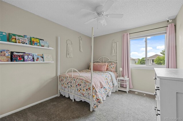 11188 Latigo Ln, Parker, CO 80138 - bedroom with carpet flooring, a textured ceiling, baseboards, and ceiling fan