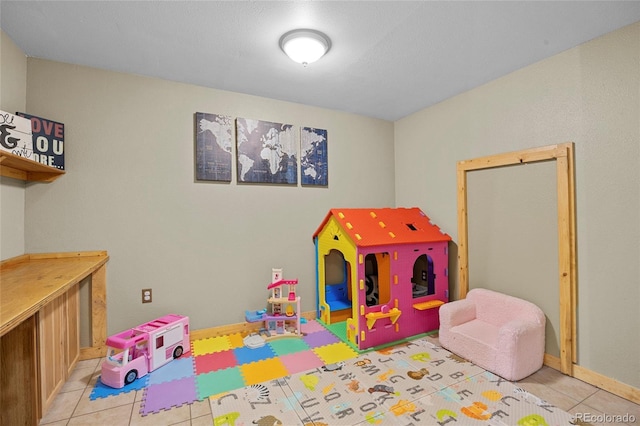 11188 Latigo Ln, Parker, CO 80138 - rec room with light tile patterned flooring and baseboards