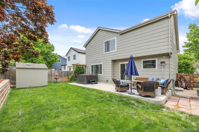 11188 Latigo Ln, Parker, CO 80138 - rear view of house with a hot tub, a patio area, and an outdoor living space