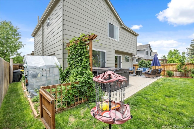 11188 Latigo Ln, Parker, CO 80138 - back of property with an outdoor living space with a fire pit, a patio area, an exterior structure, and an outdoor structure