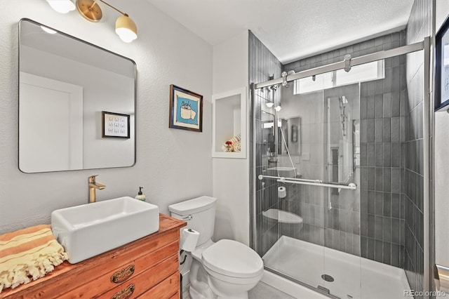 2090 Bellavista St, Castle Rock, CO 80109 - full bath featuring toilet, vanity, and a shower stall
