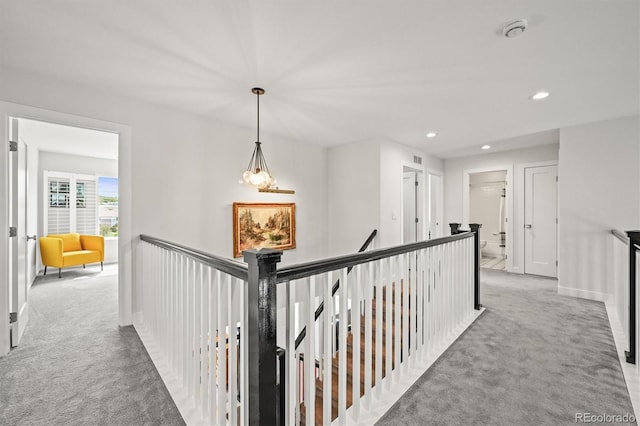 2090 Bellavista St, Castle Rock, CO 80109 - hallway with carpet flooring, an upstairs landing, recessed lighting, and baseboards