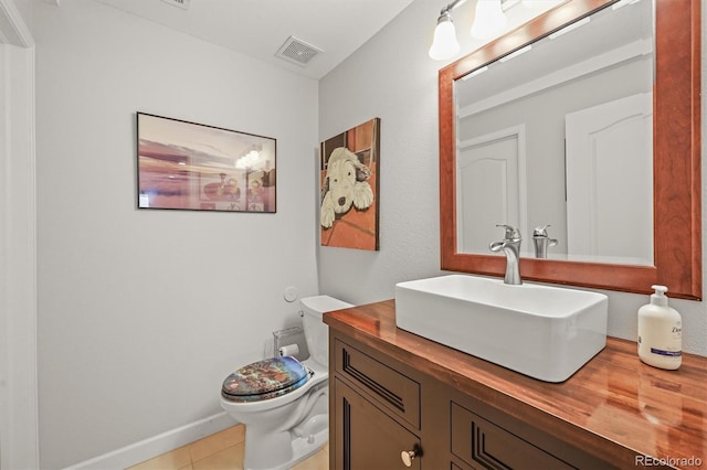 2090 Bellavista St, Castle Rock, CO 80109 - half bathroom with toilet, vanity, tile patterned floors, and baseboards